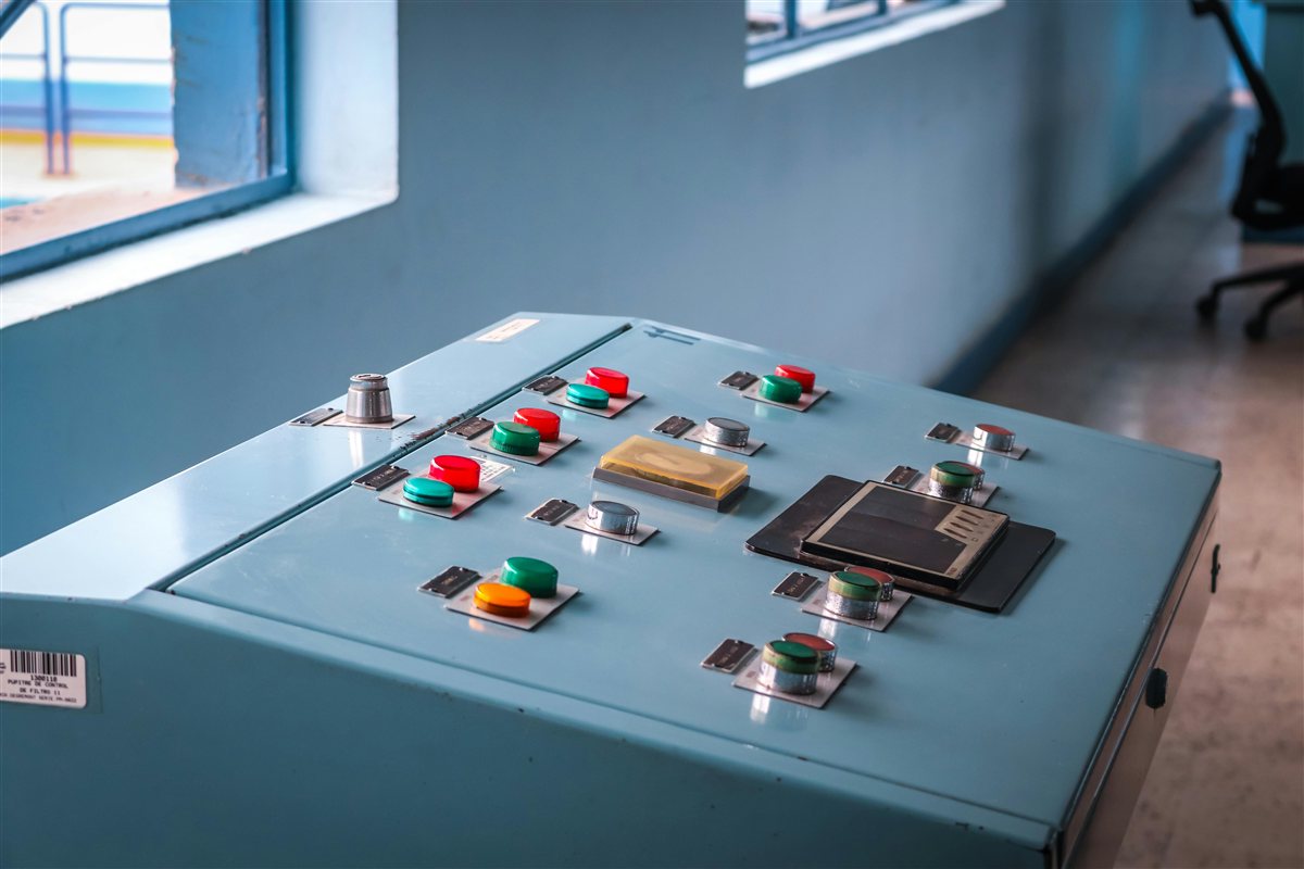 Industrial control panel with integrated PLC, VFDs, and wiring